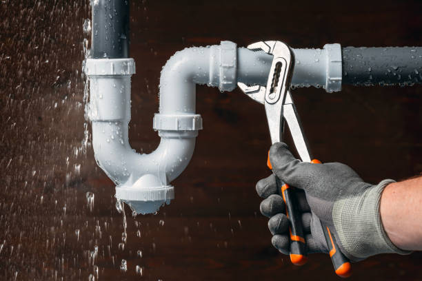 Professional Plumbing technician working in State Center, IA